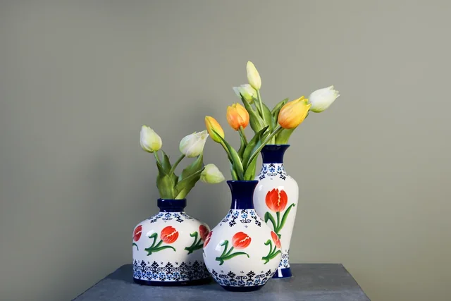 Supplier photograph of tulip-pattern vases arranged with flowers