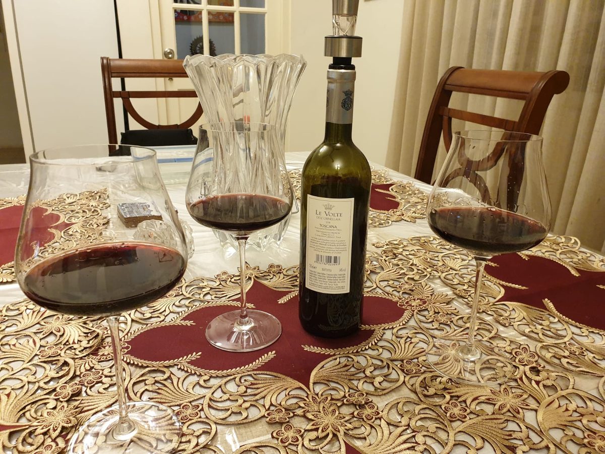 An evening table set at home with the Mirpuri family's own embroidered tablecloth