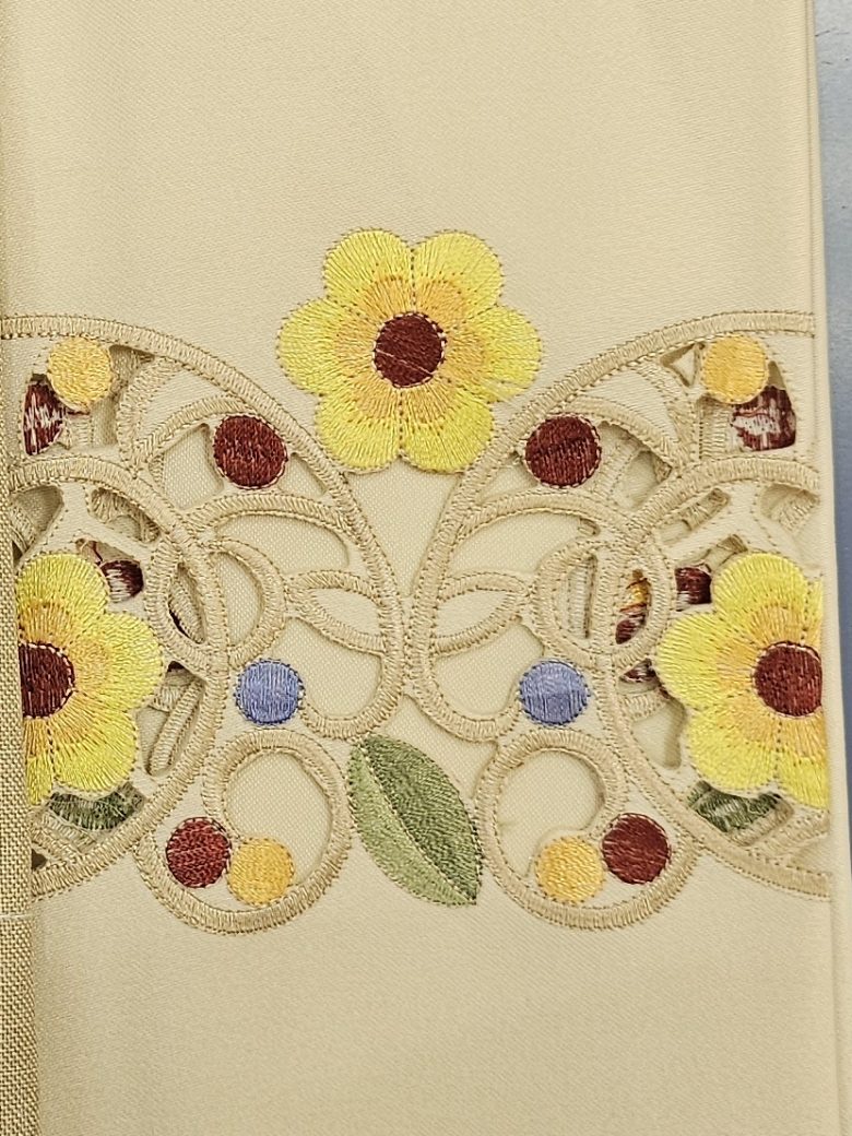 Cream guest towel with cutwork lace and coloured flower embroidery