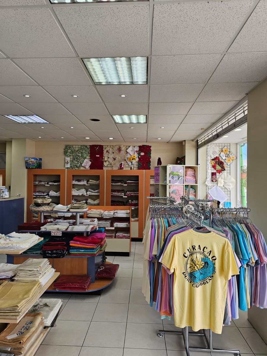 Curaçao t-shirts and gift shelves inside Mr. Tablecloth